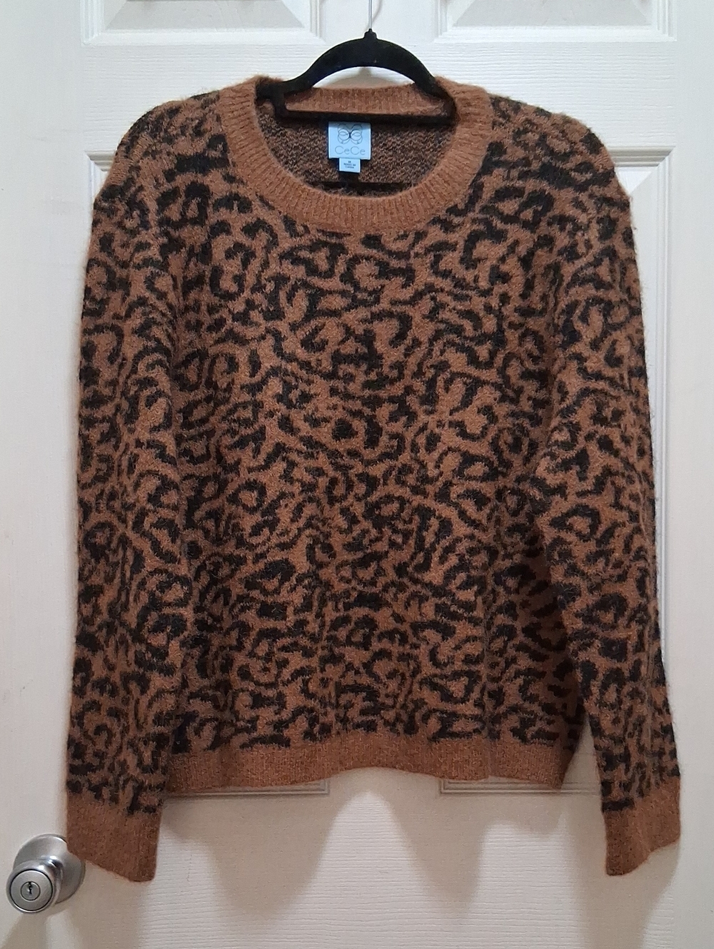 CeCe Leopard Print Fuzzy Crewneck Sweater Animal Print Crewneck in Brown & Black